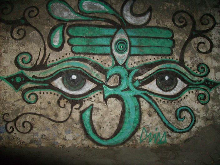 drawing of an eye on a wall